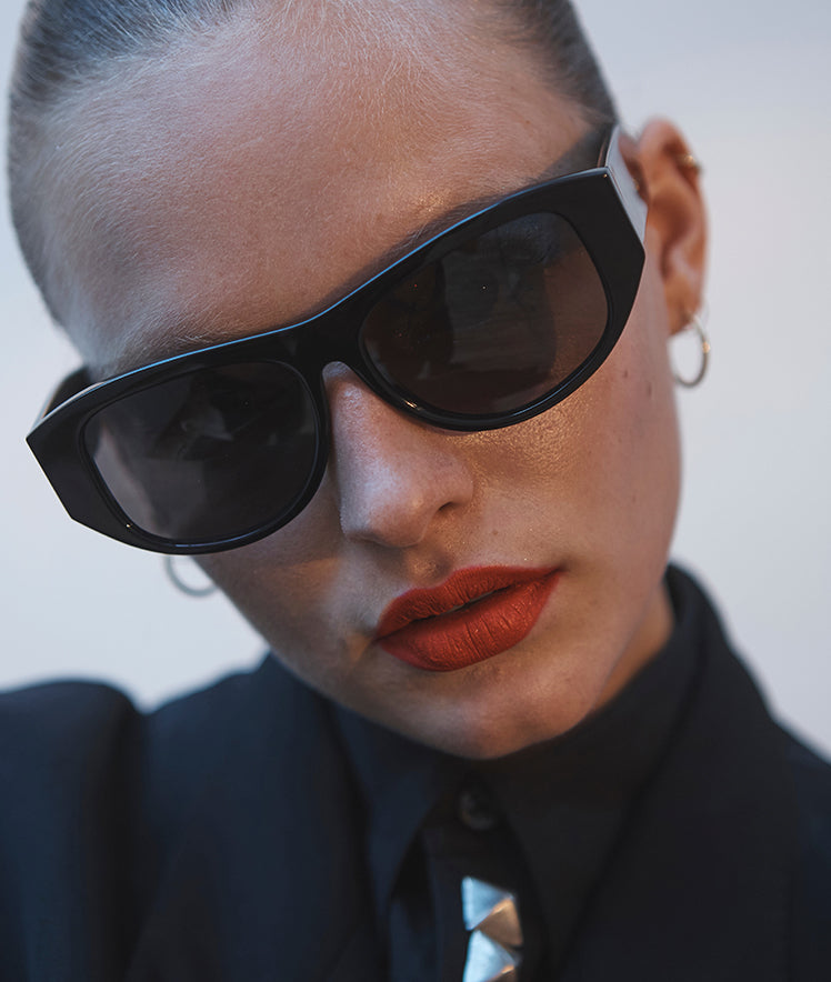 Desire-nightride-black-thick-black-sunglasses-on-model